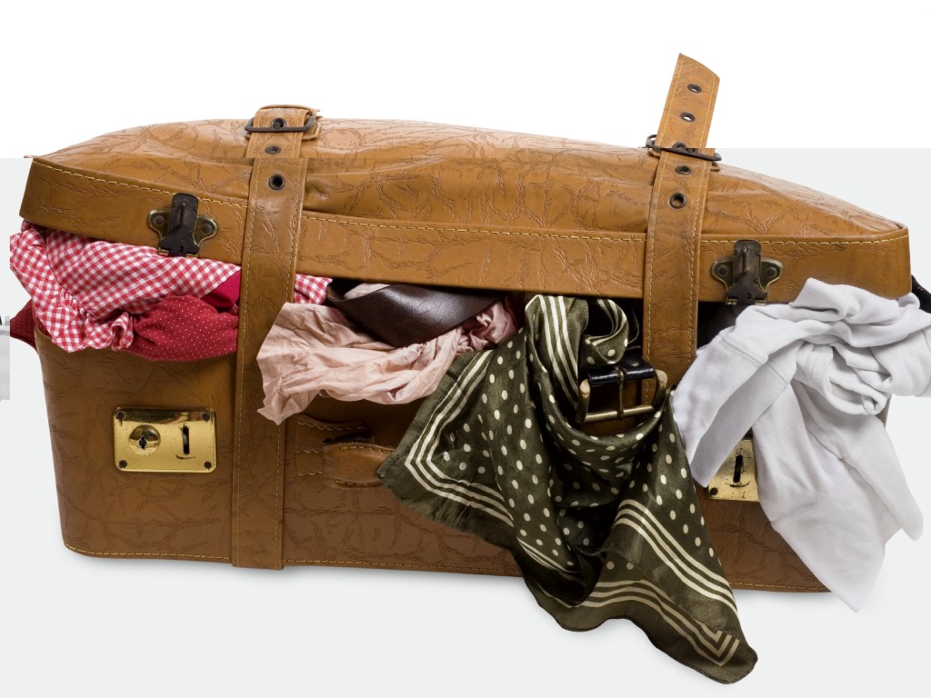 Full Suitcase findtopottawatravelagenciesdotcom